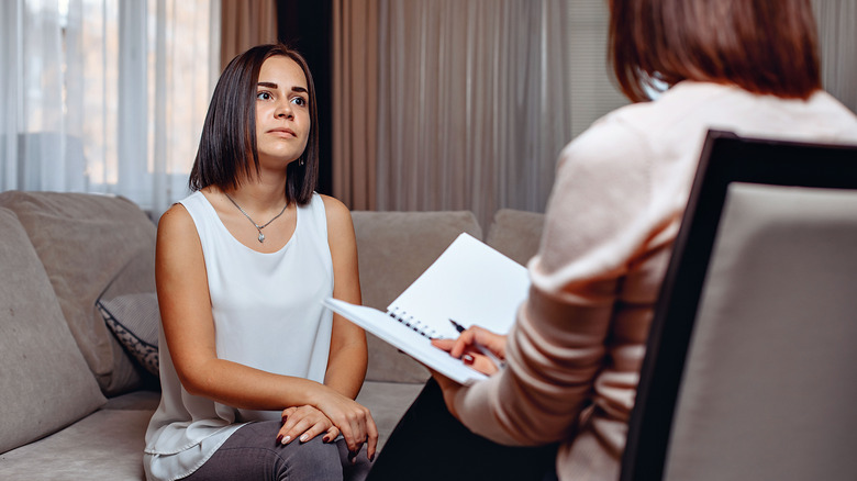 Woman speaking to therapist