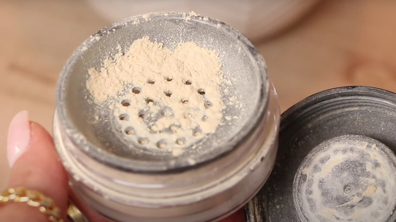 open jar of setting powder