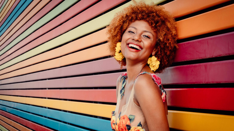 African American woman with red curly hair