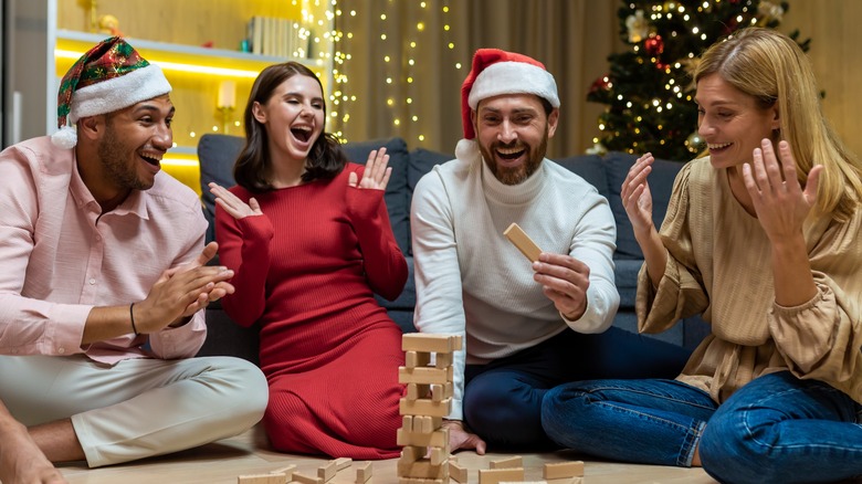 friends playing games at a Christmas party