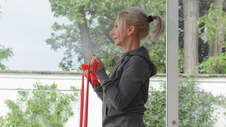 Woman using exercise bands 