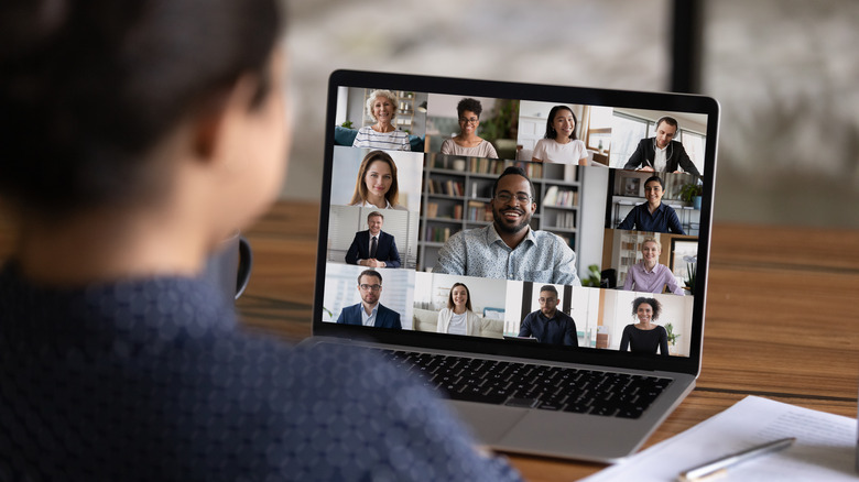 Woman conducts group video call