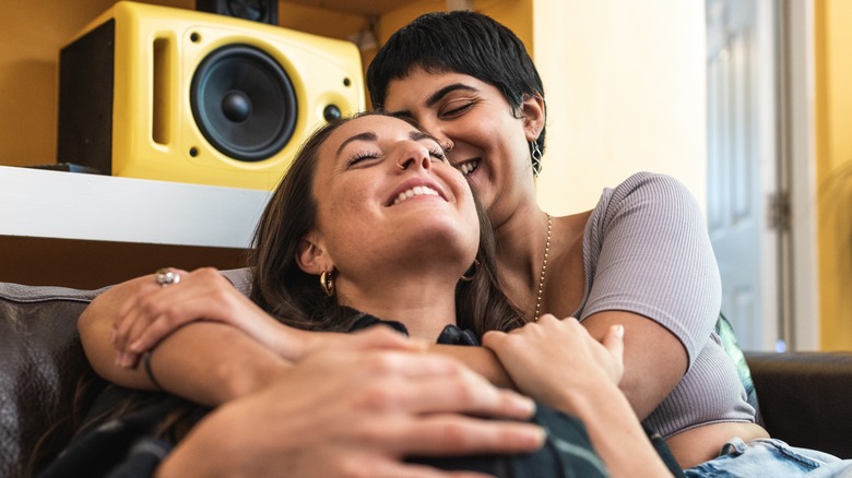 lesbian couple embracing