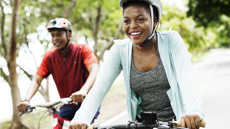 Black couple riding bikes