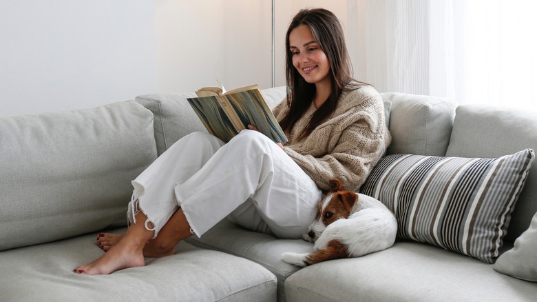 woman relaxing in loose fitting clothes