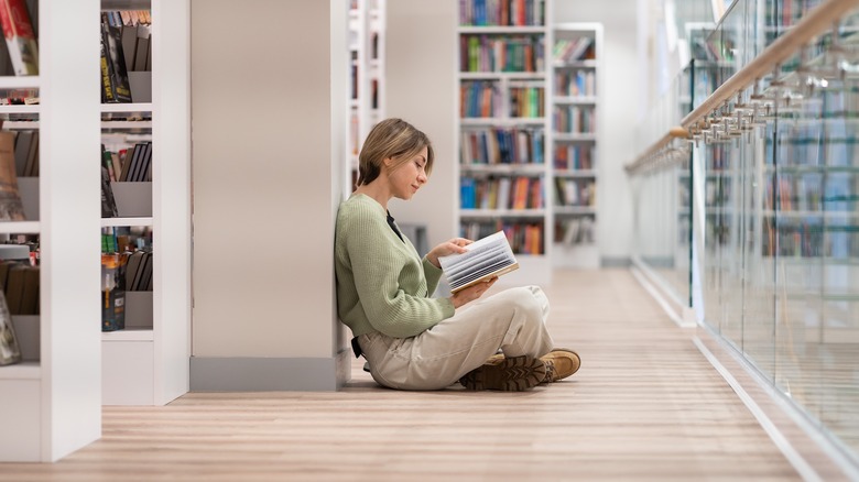 Woman reading library