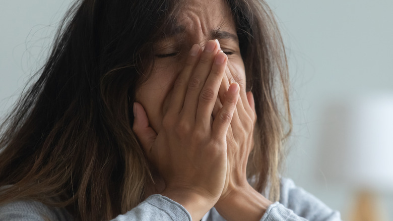 depressed young female crying