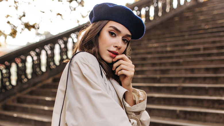 woman posing with a beret