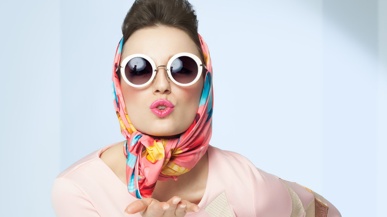 woman posing with a silk scarf