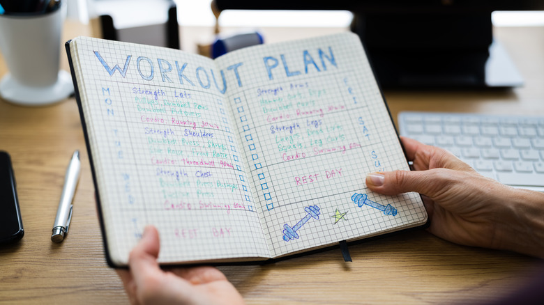Workout plan in notebook