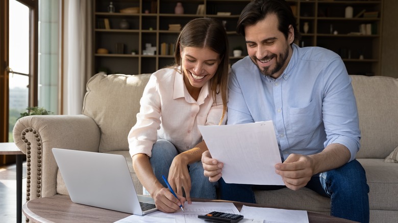 woman and man on laptop