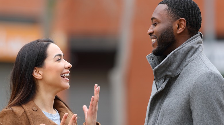 woman and man talking