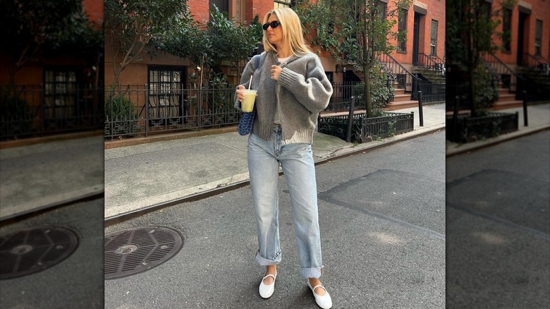 woman wearing white ballet flats