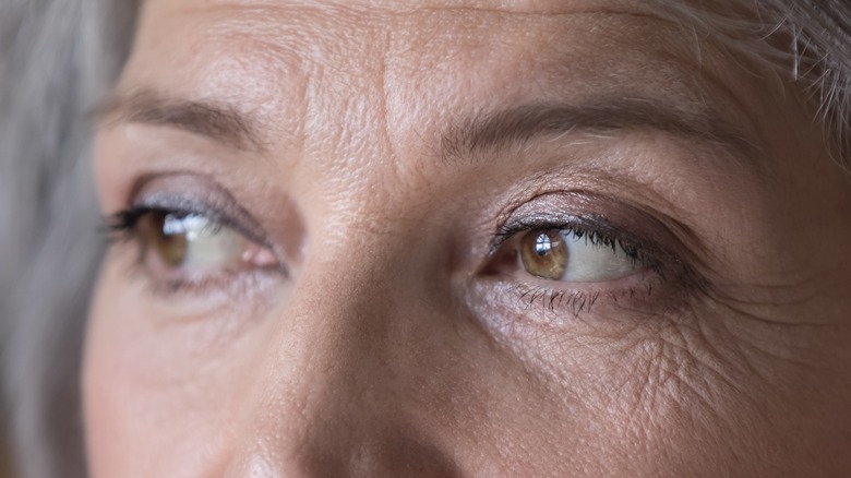 woman's eyes with wrinkles