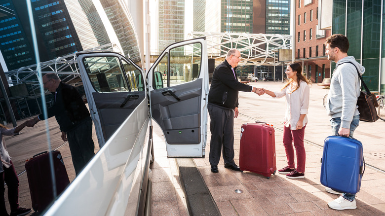 People boarding hotel shuttle