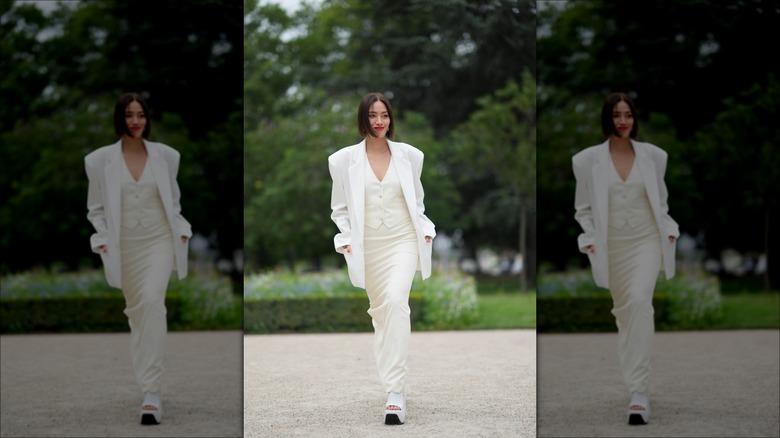 woman wearing white oversized blazer