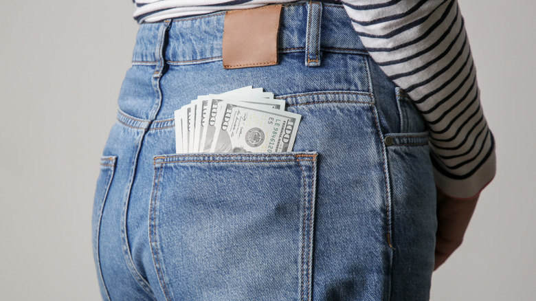 money in jeans pocket