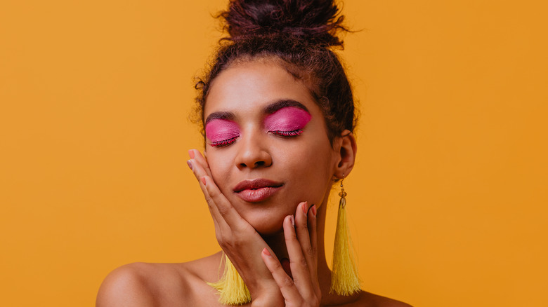 woman with pink eyeshadow look