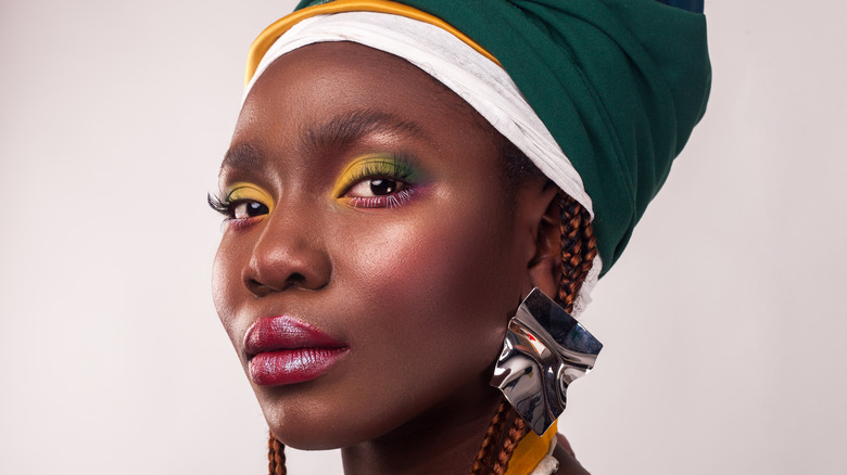 woman wearing headwrap posing