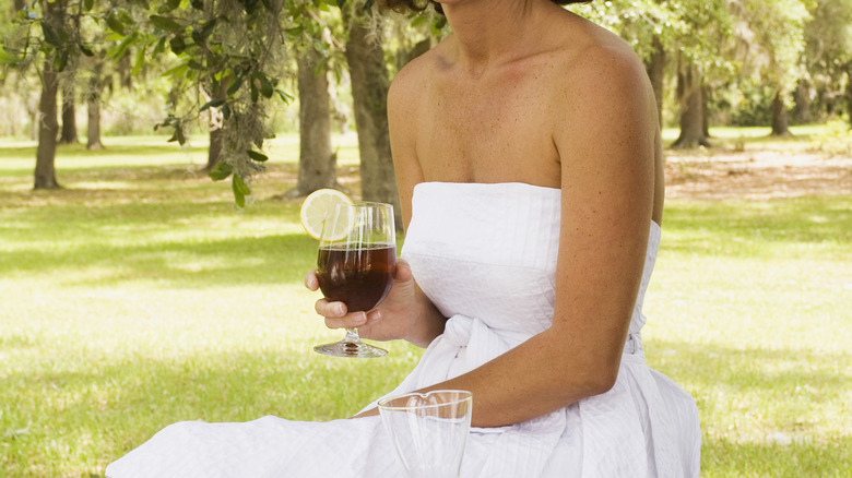 woman in a white strapless dress