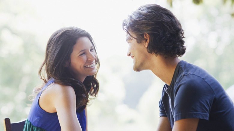 woman smiling at man