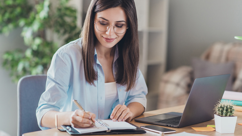 woman writing letter 