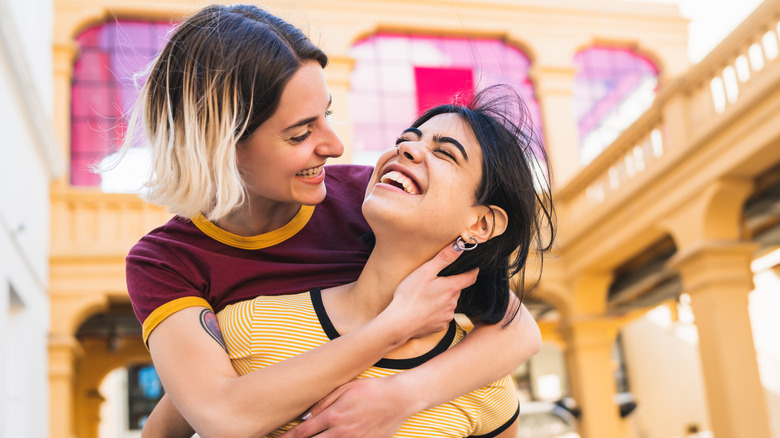 lesbian couple embracing