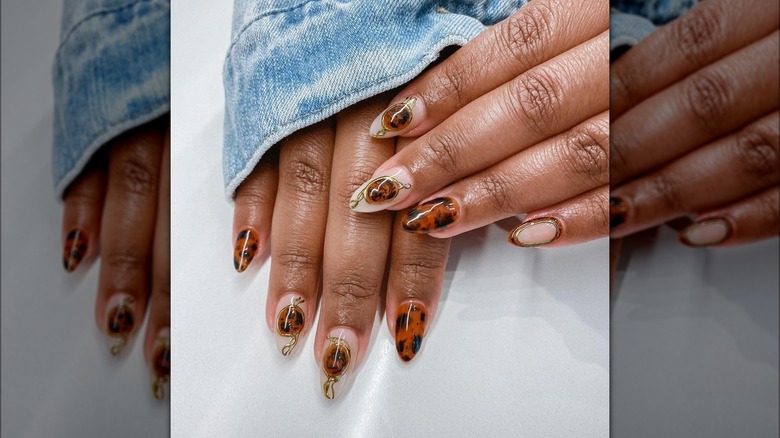 Woman wearing designed nails