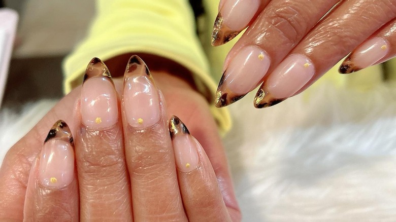 Woman with Tortoiseshell french nails