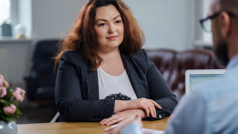 Woman negotiating with boss