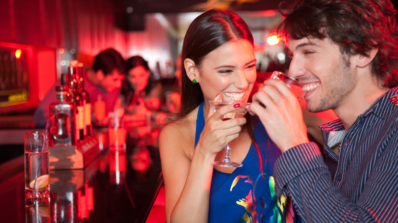 Couple on a date at a bar 