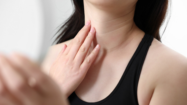 woman looking at neck