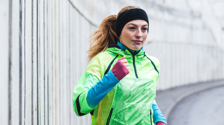 Woman running in the cold