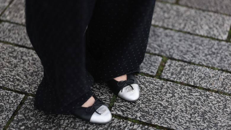 Woman in flats on the street
