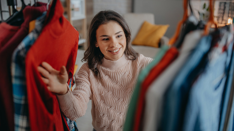 Woman exploring her closet