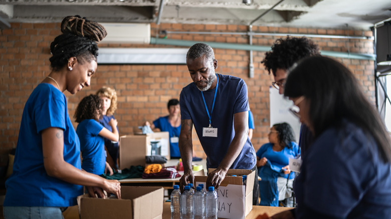 Young adults packing donations