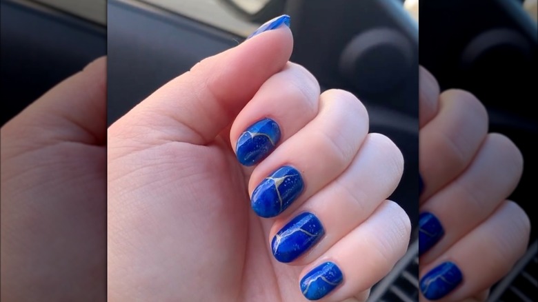 Blue and gold kintsugi nails