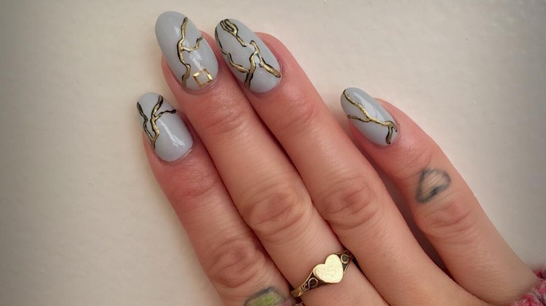 Pale blue kintsugi nails