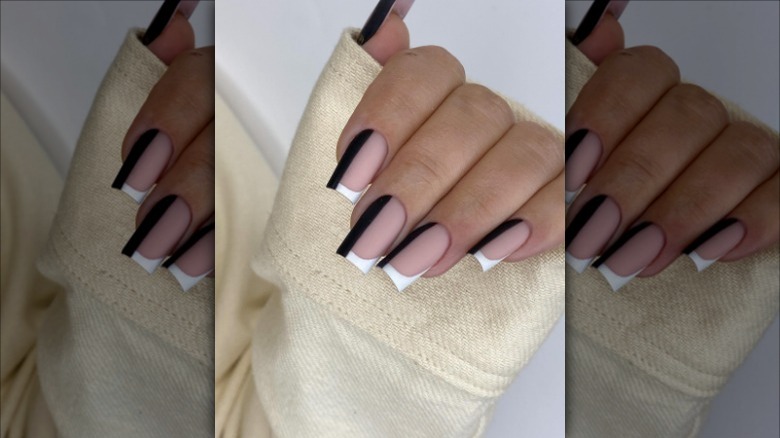 manicure with white tip and black lines