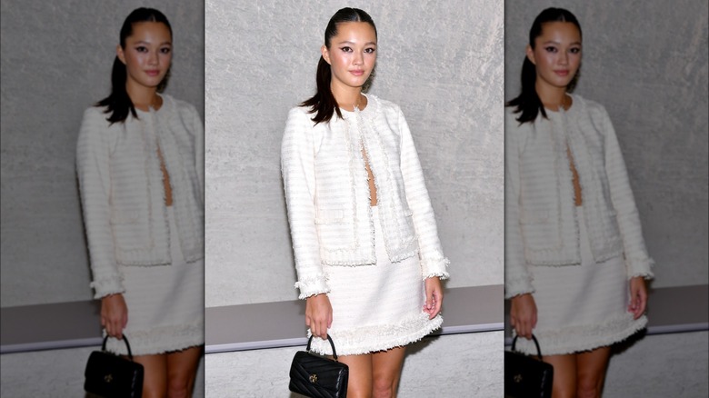 Lily Chee in white tweed skirt set