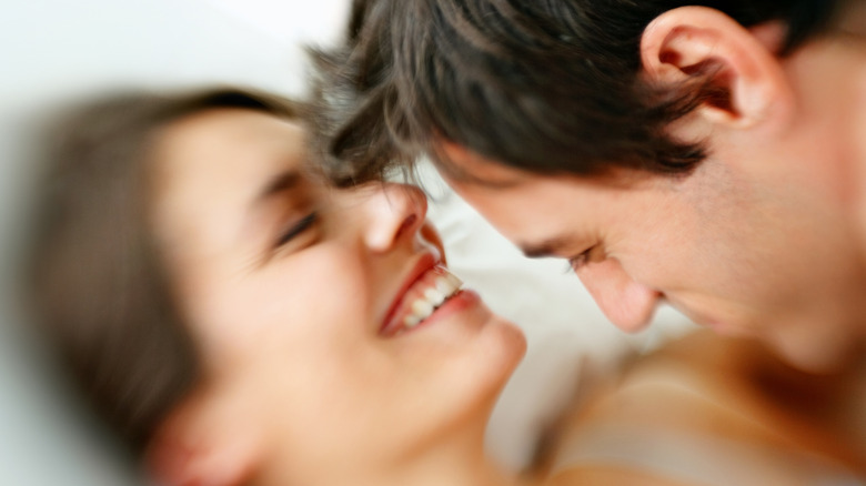 woman smiling with man