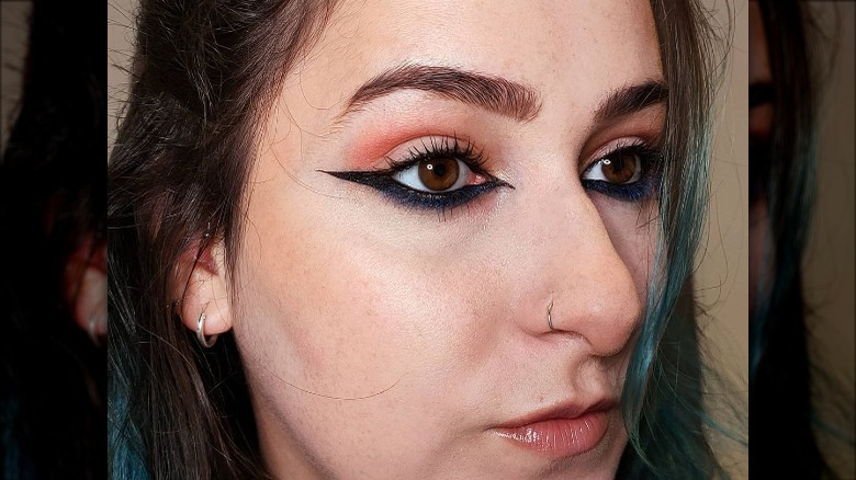 woman with inverted eyeliner