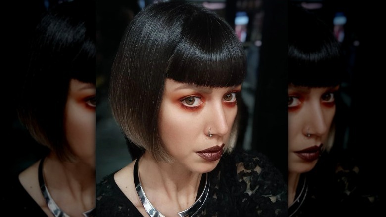 woman with coral underliner