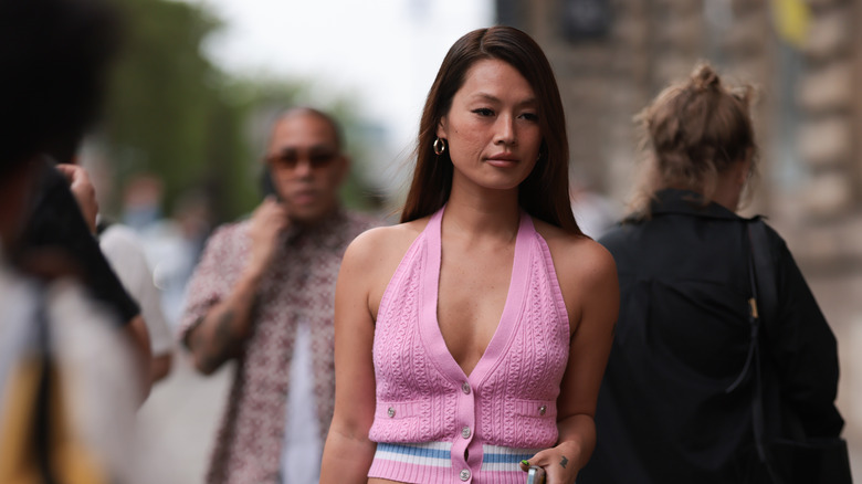 Woman in sweater halter