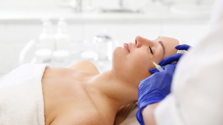 woman getting a plasma injection