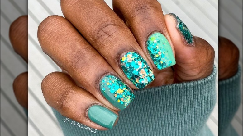 teal glitter manicure