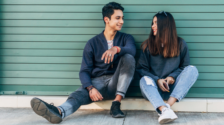 Couple smiling at each other