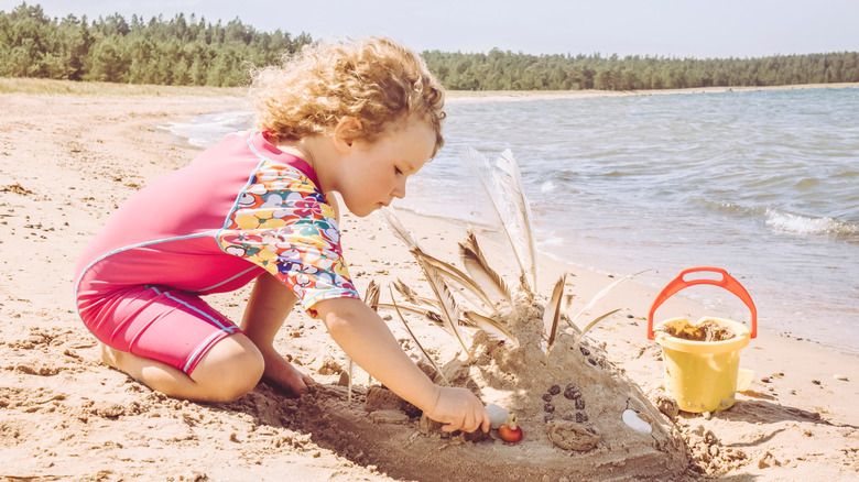 Child playing on beach