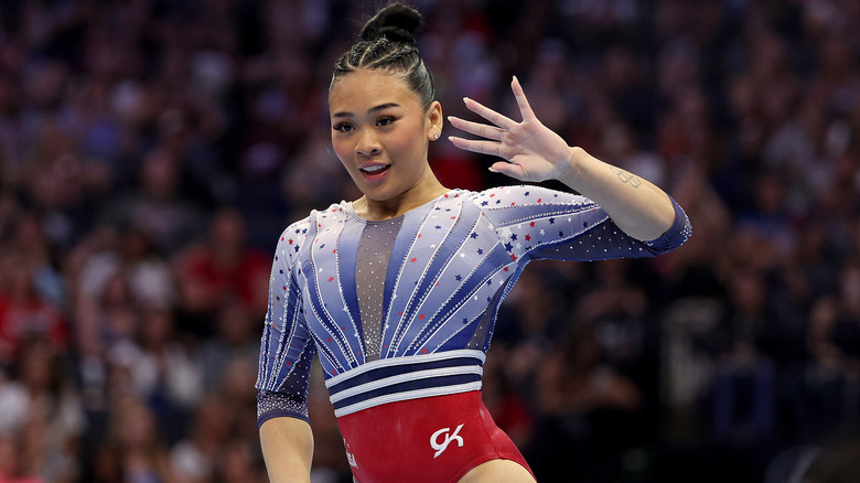 Suni Lee in red, white, blue leotard