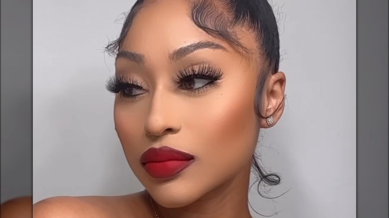 woman wearing red lip color